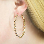 A Whirl and a Twirl Gold Hoop Earring